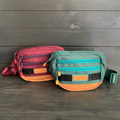 Wilderdog Utility Fanny Pack stores Treats, Balls, Keys in 3 Pockets with adjustable strap and Poop Bag dispenser (Huckleberry) - Pawvie